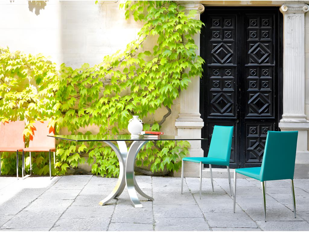 Dining table with curved polished steel base JUZZ54650