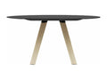 Round designer table in Mobenze with natural solid oak legs. Mobenze - Black color - Diameter 129 cm AKDG01324